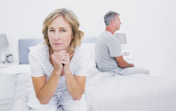 thoughtful-couple-sitting-different-sides-bed-having-dispute.jpg